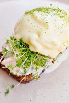 Traditional Scandinavian shrimp toast (toast Skagen) with dill, egg and mayonnaise