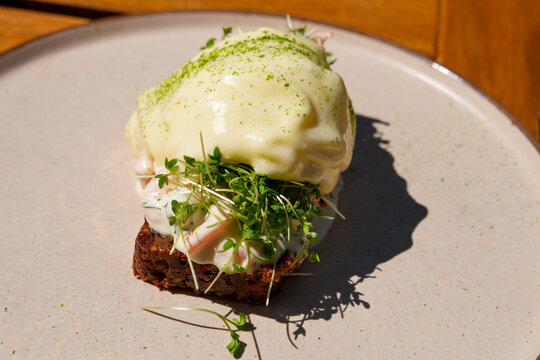 Traditional Scandinavian shrimp toast (toast Skagen) with dill, egg and mayonnaise