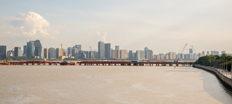 Binjiang District skyline, construction along Qiantang River, Hangzhou, China