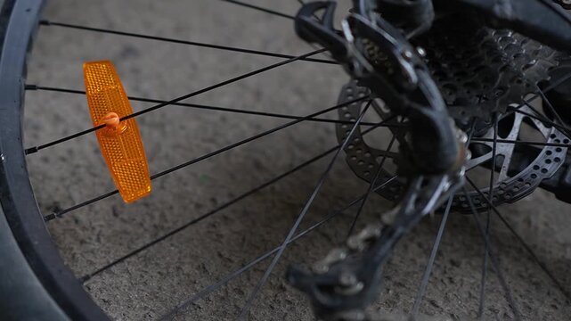 Bicycle wheel light reflector installation. Preparing your bike for the season. Updating parts, riding safety. Installing reflectors on wheels