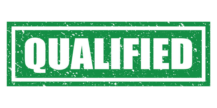 A green rectangular rubber stamp with the word qualified written in white capital letters on a white background