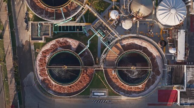 Aerial view of circular sedimentation tanks at a water treatment plant in Santo Domingo, Distrito Nacional, Dominican Republic.