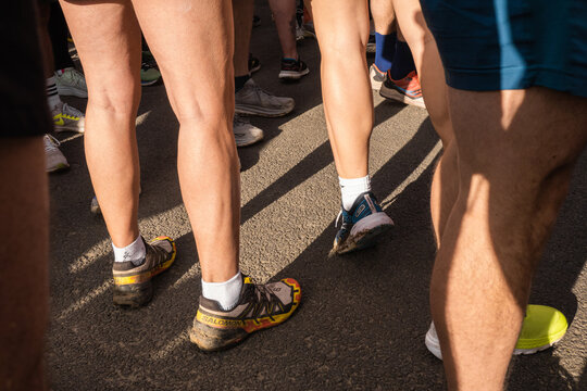 Kielder Waters, Northumberland, United Kingdom - October 5th, 2025: Runners gathered at the start of Keilder half marathon, Northumberland, United Kingdom. Sunlit sporting scene capturing preparation