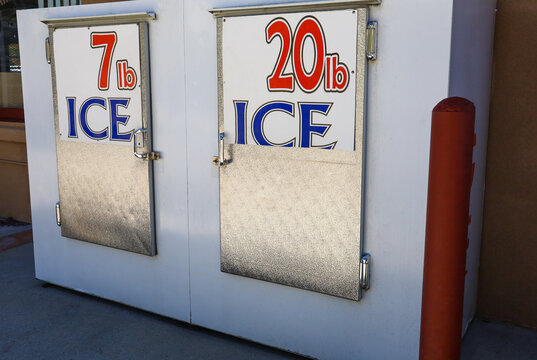 Commercial Ice Merchandiser Machine with 7lb and 20lb Bag Signs.