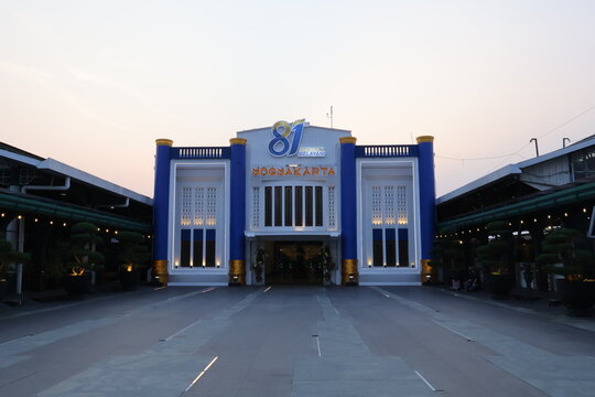 YOGYAKARTA, INDONESIA - SEPTEMBER 30, 2026: Exterior facade view of Yogyakarta Tugu railway station building entrance at dusk.