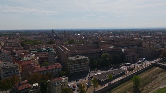 Aerial drone view of Palazzo della Pilotta in Parma, Italy, showcasing the monumental historic complex, grand courtyards, Italian architecture, and surrounding old town cityscape.