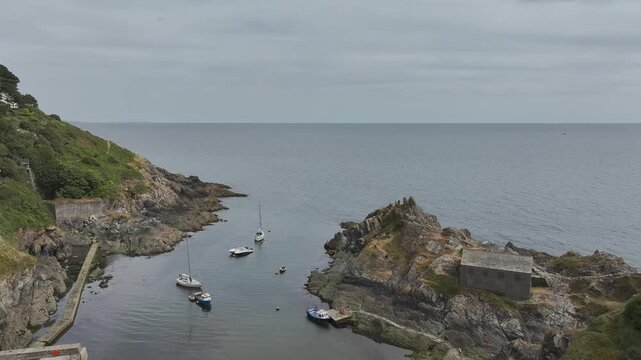 Polperro Harbour and Village from a drone, Polperro, Looe, Cornwall, England, United Kingdom