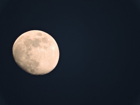 full moon over blue sky