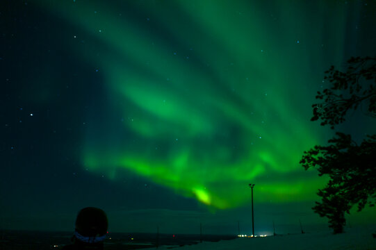 Aurora Over the Floodlit Piste