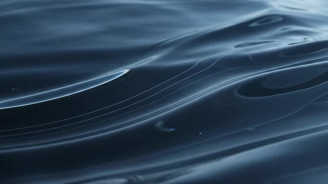 Abstract Fluid Surface Moving in Shimmering Blue Tones