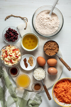 Several recipe ingredients used for making morning glory muffins.