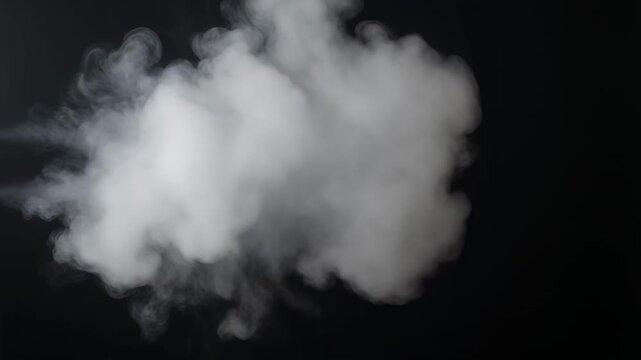 Backgrounds - White smoke cloud puff billowing expanding and dissipating on black background loop
