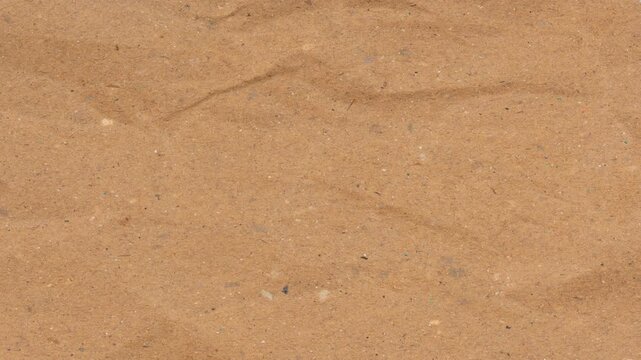Crumpled brown paper stop motion animation, Textured paper background. Brown paper texture stop motion animation.