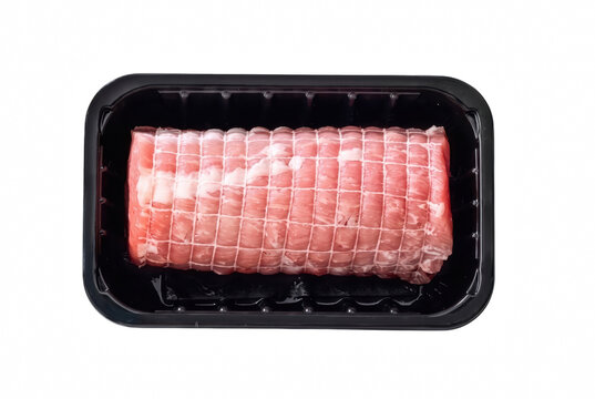 Raw pork roast tied with white twine in a plastic tray