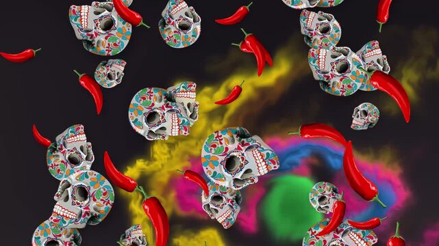 Mexican Sugar Skulls and Red Chili Peppers Falling Against Colorful Smoke