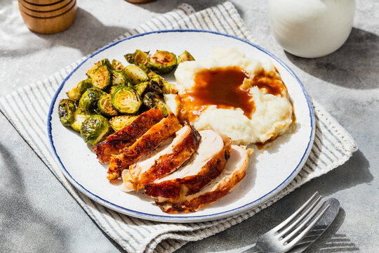 Homemade Healthy Roasted Chicken Turkey Dinner with Potatoes and Brussel Sprouts