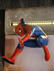 Naklejka premium Wuhan, China-Oct.6th 2026: Spider-Man superhero action pose statue in cinema