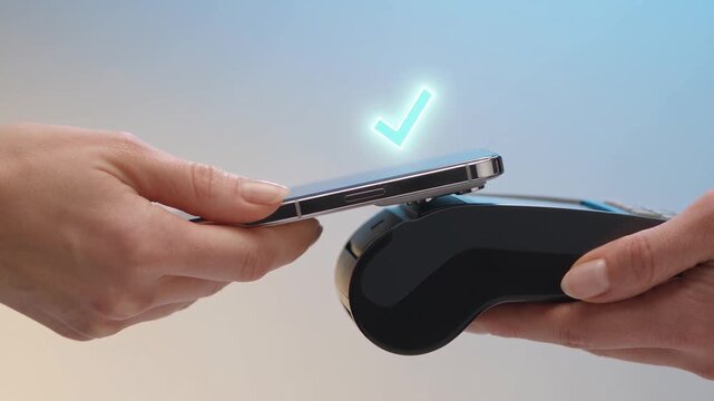 Close-Up of Hand Holding Smartphone for NFC Contactless Payment on EDC Terminal