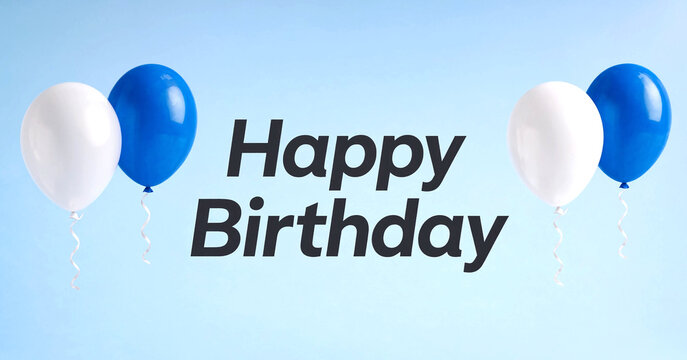 Happy Birthday Balloons Floating Against Light Blue Sky Background