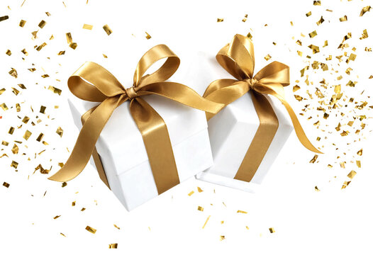 Two elegant gift boxes tied with golden ribbon surrounded by confetti