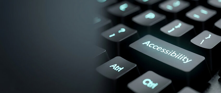Close-up of a Sleek Modern Backlit Computer Keyboard with a Dedicated Button Labeled Accessibility, Highlighting Inclusive Design, Assistive Technology, and Universal Digital Access for All Users