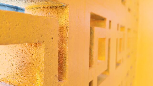 Yellow brick wall background materials suitable for site visits presentations and advertisements.