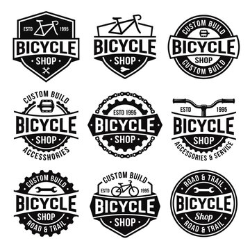This image showcases a collection of six unique bicycle shop logos featuring custom builds, accessories, and road and trail designs, emphasizing cycling culture and craftsmanship.
