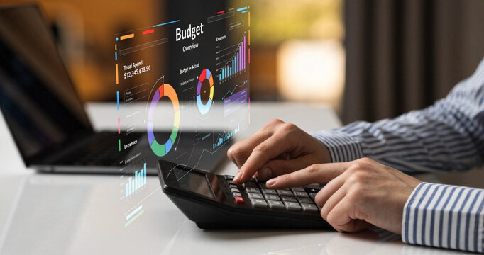 Financial budget overview dashboard with interactive growth charts and electronic calculator. Accountant calculating corporate budget metrics using modern digital chart overlays at office