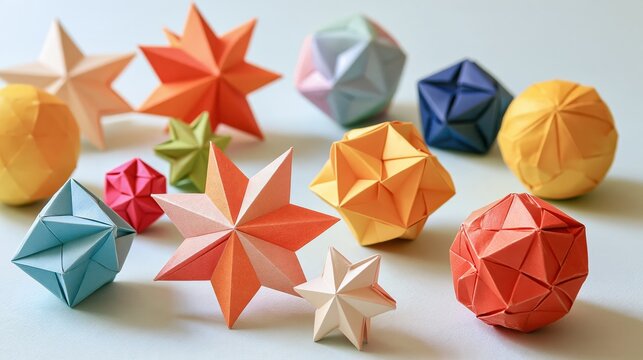Colorful origami geometric shapes arranged in a studio setting with soft ambient light and shallow depth of field