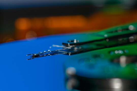 Hard drive actuator arm reading data