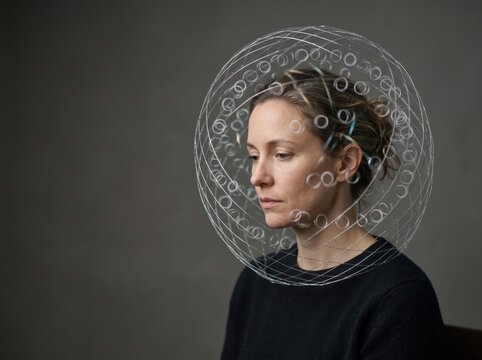 Woman experiencing rumination, surrounded by thought bubbles representing repetitive worries, overthinking, intrusive thoughts, and mental exhaustion