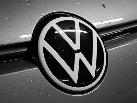 Germany, Paderborn, October 08. 2026, Volkswagen (VW) logo emblem mounted on the silver metallic grille of a vehicle