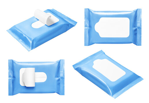 Set of four blue wet wipes packages with blank labels, isolated on transparent cutout background
