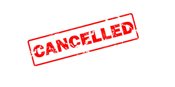 Red rubber stamp impression with the word cancelled isolated on a white background