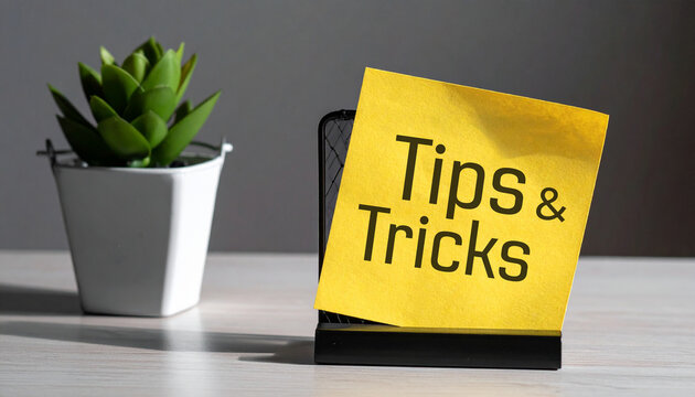 tips and tricks sign on white background