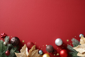 Fototapeta premium Christmas flat lay background with luxury red ornaments and copy