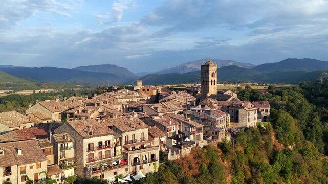 Aerial view above medieval village of Ainsa and castle in Spanish Pyrenees, Huesca, Spain
