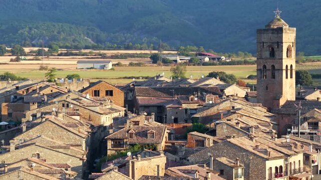 Aerial view above medieval village of Ainsa and castle in Spanish Pyrenees, Huesca, Spain