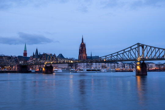 Frankfurt Skyline at Blue Hour with Eiserner Steg Bridge and Frankfurt Cathedral over the Main River