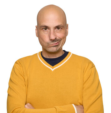 Bald man in yellow sweater. Guy with confident smirk isolated