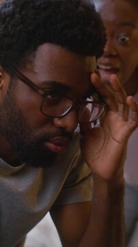 African American married couple arguing at home bedroom angry wife screaming shouting at husband family conflict divorce quarrel marriage problem man ignoring gesture explaining relationship fight