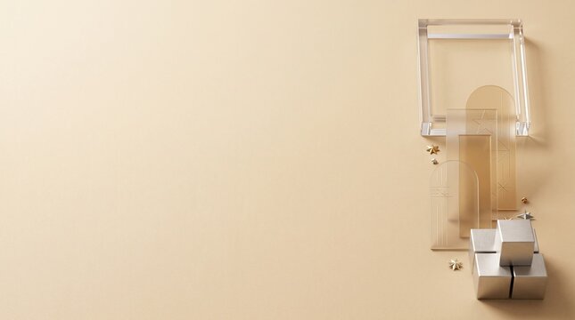 Transparent acrylic display blocks and glass geometric shapes on beige