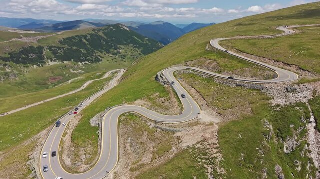 Crowded Hairpin Turn on Transalpina Ridge