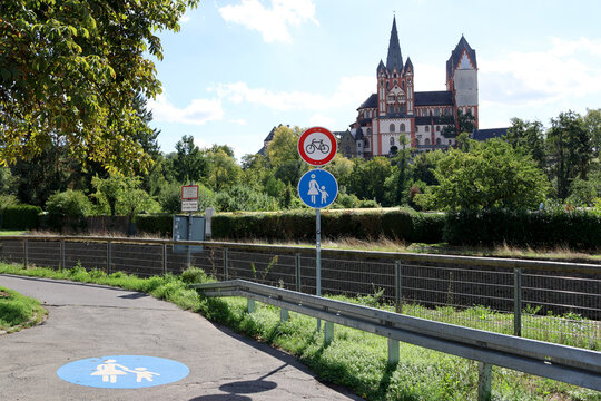 No cycling and pedestrian path signs below Limburg Cathedral