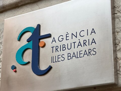 Mallorca, spain, october 07, 2026 agencia tributaria illes balears sign on carrer francesc de borja moll in palma, spain, representing tax administration