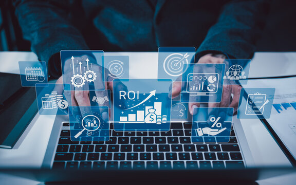 Return on investment and business performance analytics concept. Businessman using finance dashboard represents ROI growth, strategic planning, profitability, efficiency, target, data driven decisions