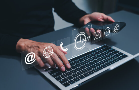 Customer support and 24/7 service concept. professional using laptop and phone, surrounded by icons for email, phone, global communication, help desk, technical assistance, continuous online support