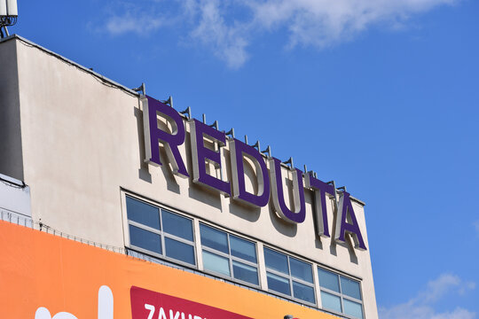 Reduta shopping mall facade with emblem, signage, logo. WARSAW, POLAND - APRIL 18, 2026