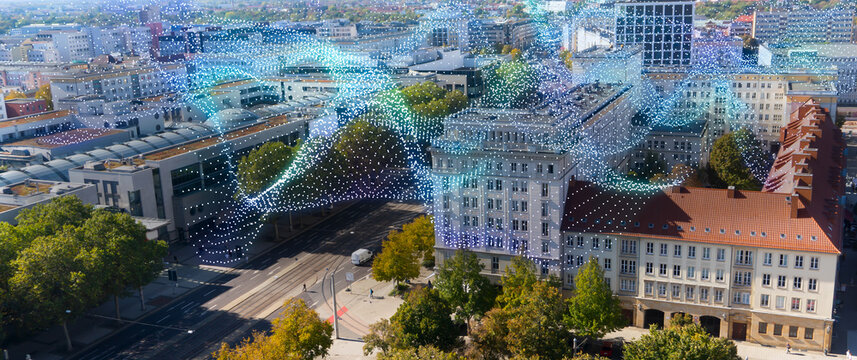 digital dotted data cloud over real cityscape, smart city concept