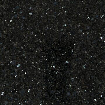 Black granite stone texture background with sparkling mineral crystals